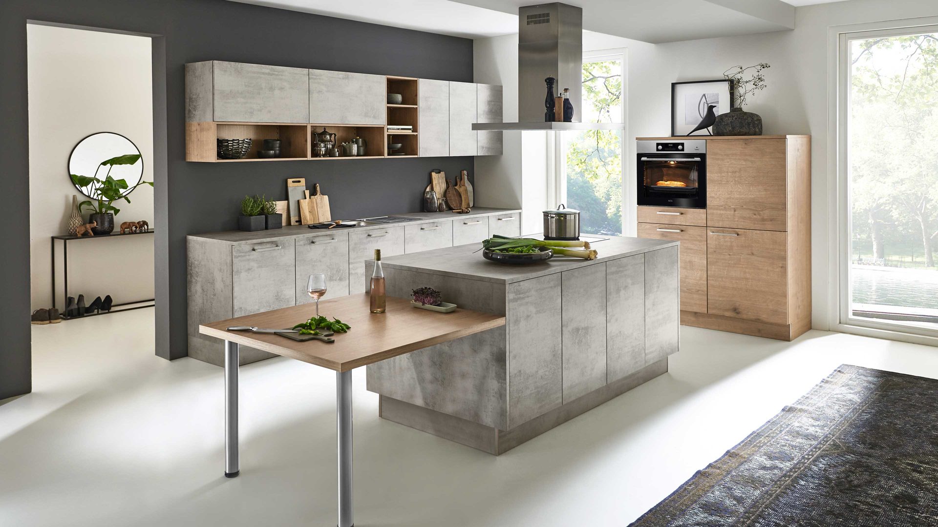 Einbauküche Nolte® küchen aus Holz in Grau nolte® Einbauküche Stone mit AEG-Einbaugeräten Beton & Steineiche – dreizeilig