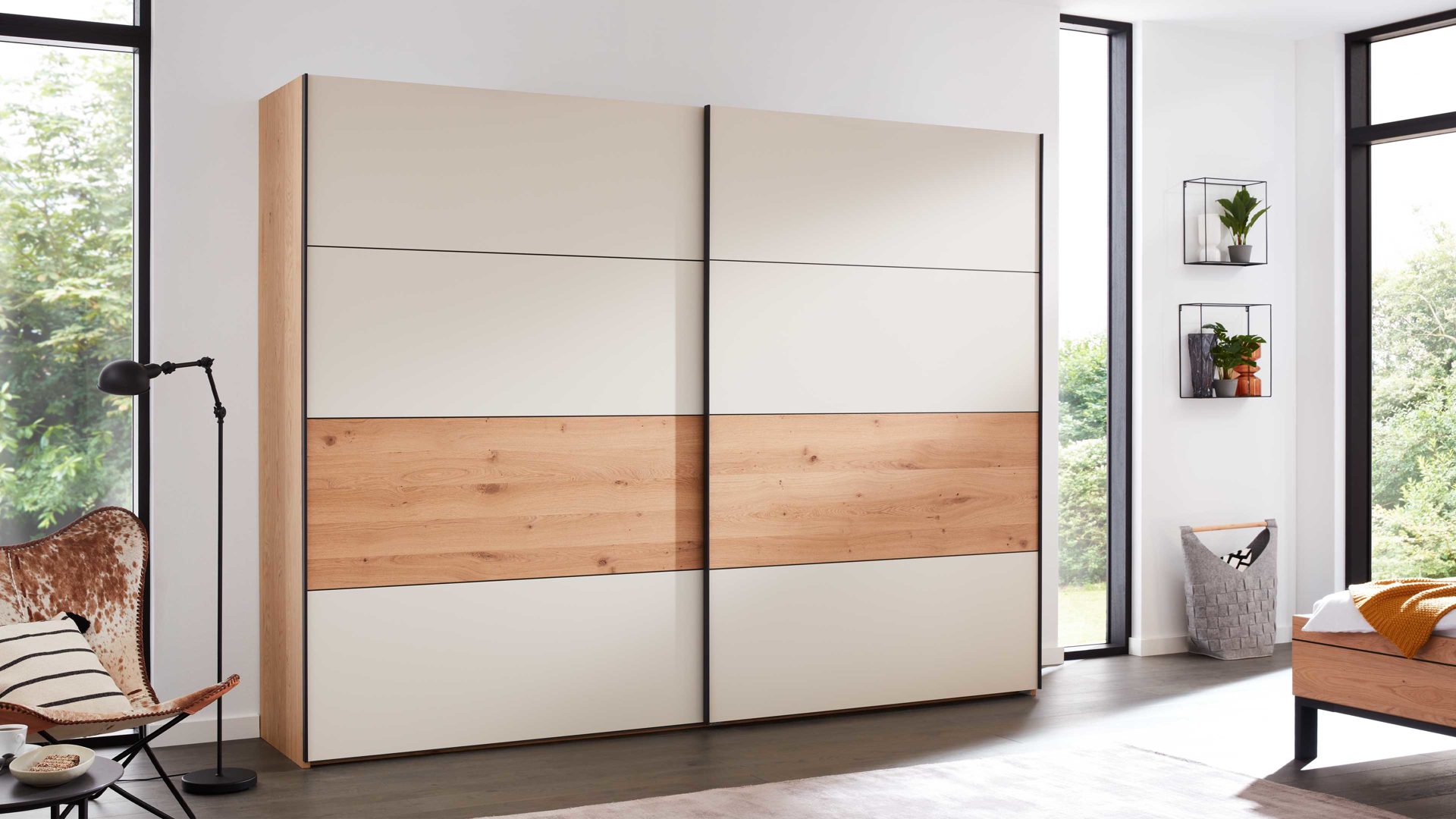 Kleiderschrank Interliving aus Holz in Beige Interliving Schlafzimmer Serie 1024 – Schwebetürenschrank 982706 Design 27,  Sand & Balkeneiche - zwei Türen, Breite ca. 271 cm