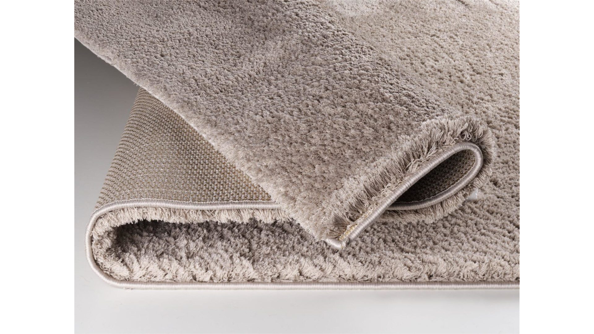 Hochflorteppich Oci aus Kunstfaser in Beige Hochflorteppich Soft Dream für Ihre Wohnaccessoires beige Kunstfaser – ca. 140 x 200 cm