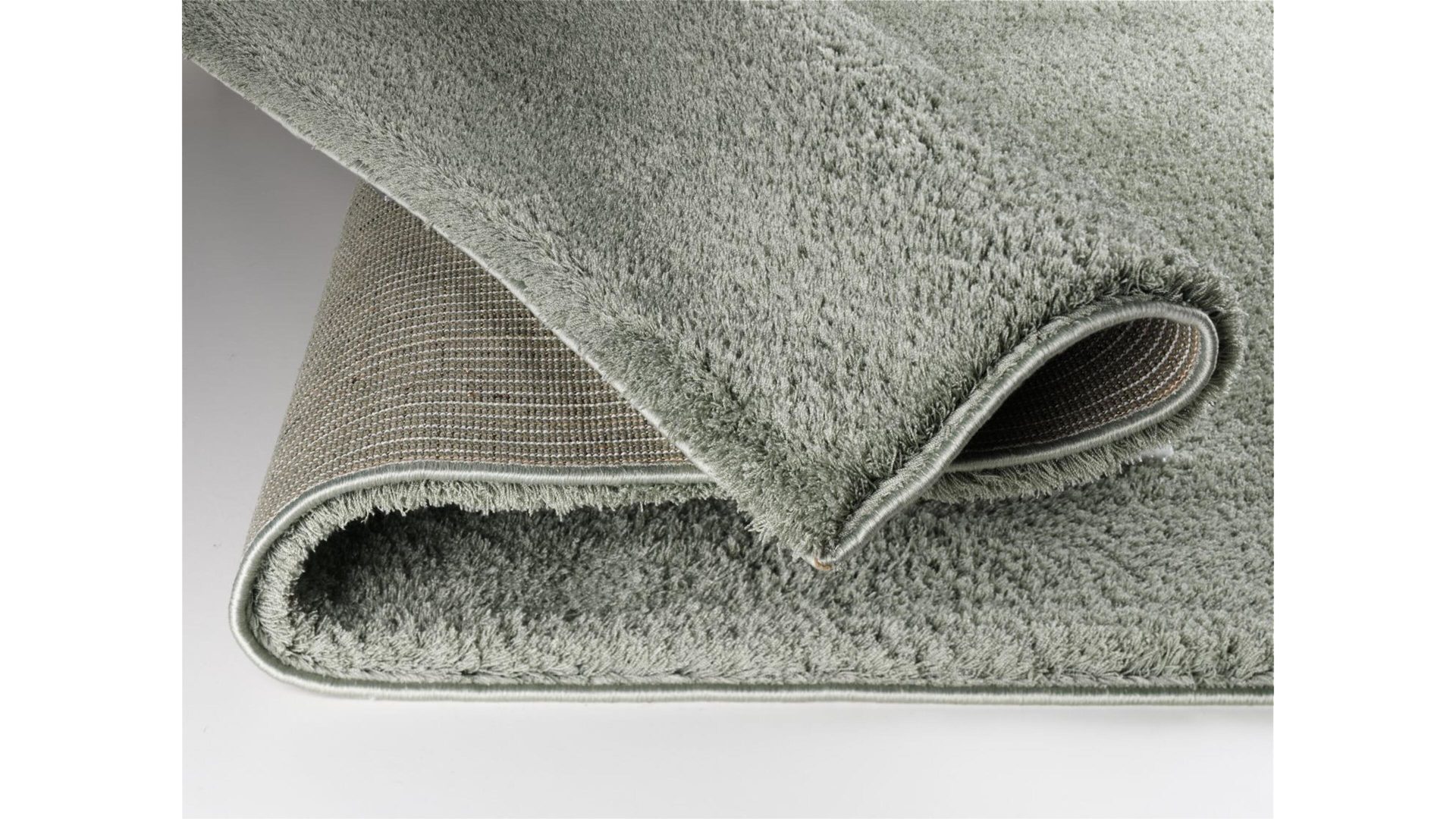 Hochflorteppich Oci aus Kunstfaser in Grün Hochflorteppich Soft Dream für Ihre Wohnaccessoires olivfarbene Kunstfaser – ca. 65 x 130 cm