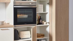 Einbauküche culineo® aus Holz in Holzfarben Culineo® Einbauküche C187 mit Einbaugeräten Eiche Como & Magnolie - Länge ca. 460 cm