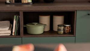 Einbauküche Interliving aus Holz in Dunkelgrün Interliving Küche Serie 3083 mit AEG Einbaugeräten Black Green & Nussbaum Kuba  - dreizeilig