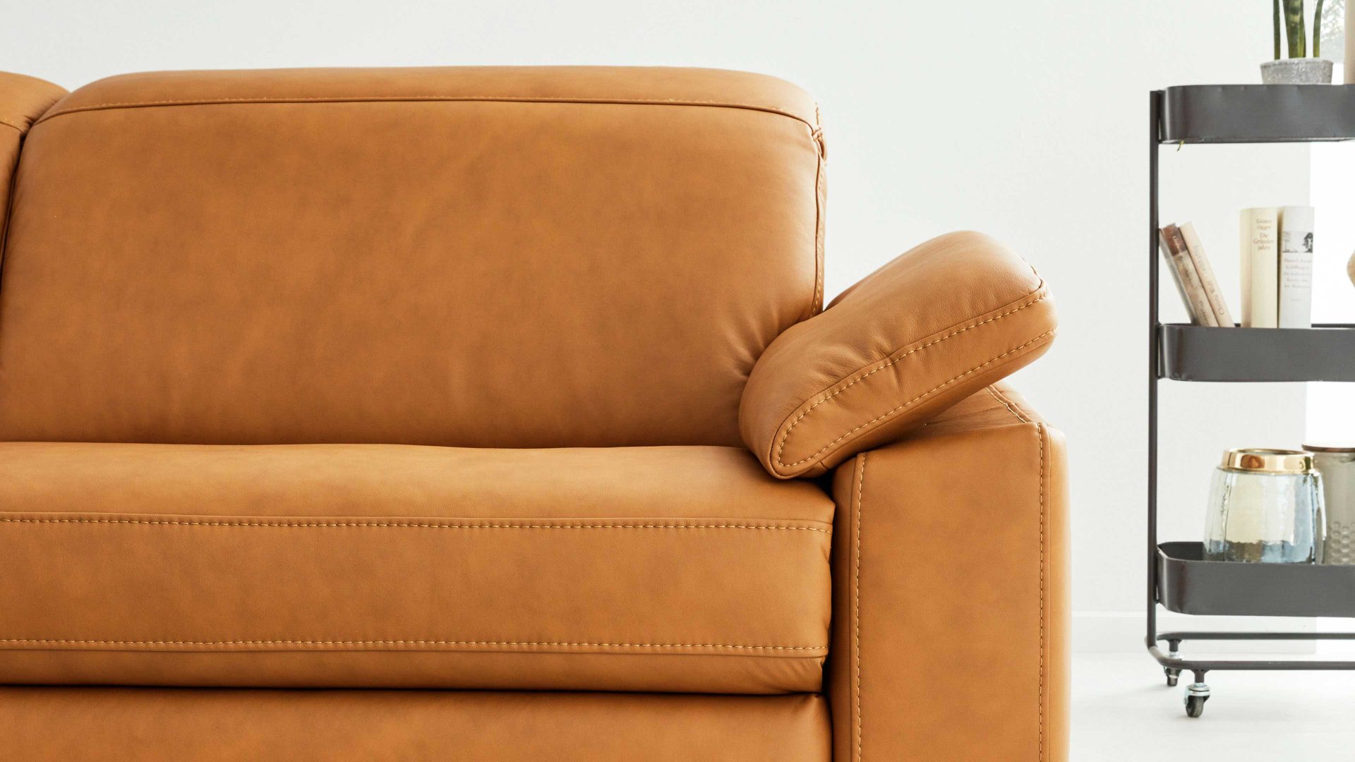 Funktion Interliving aus Metall in Transparent Interliving Sofa Serie 4054 – Armlehnverstellung manuelle Verstellung