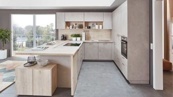 Einbauküche Nobilia® aus Holz in Holzfarben Hell nobilia® Einbauküche Riva mit BORA Muldenlüfter Beton Sand & Eiche Montreal - Stellfläche ca. 304 x 319 cm
