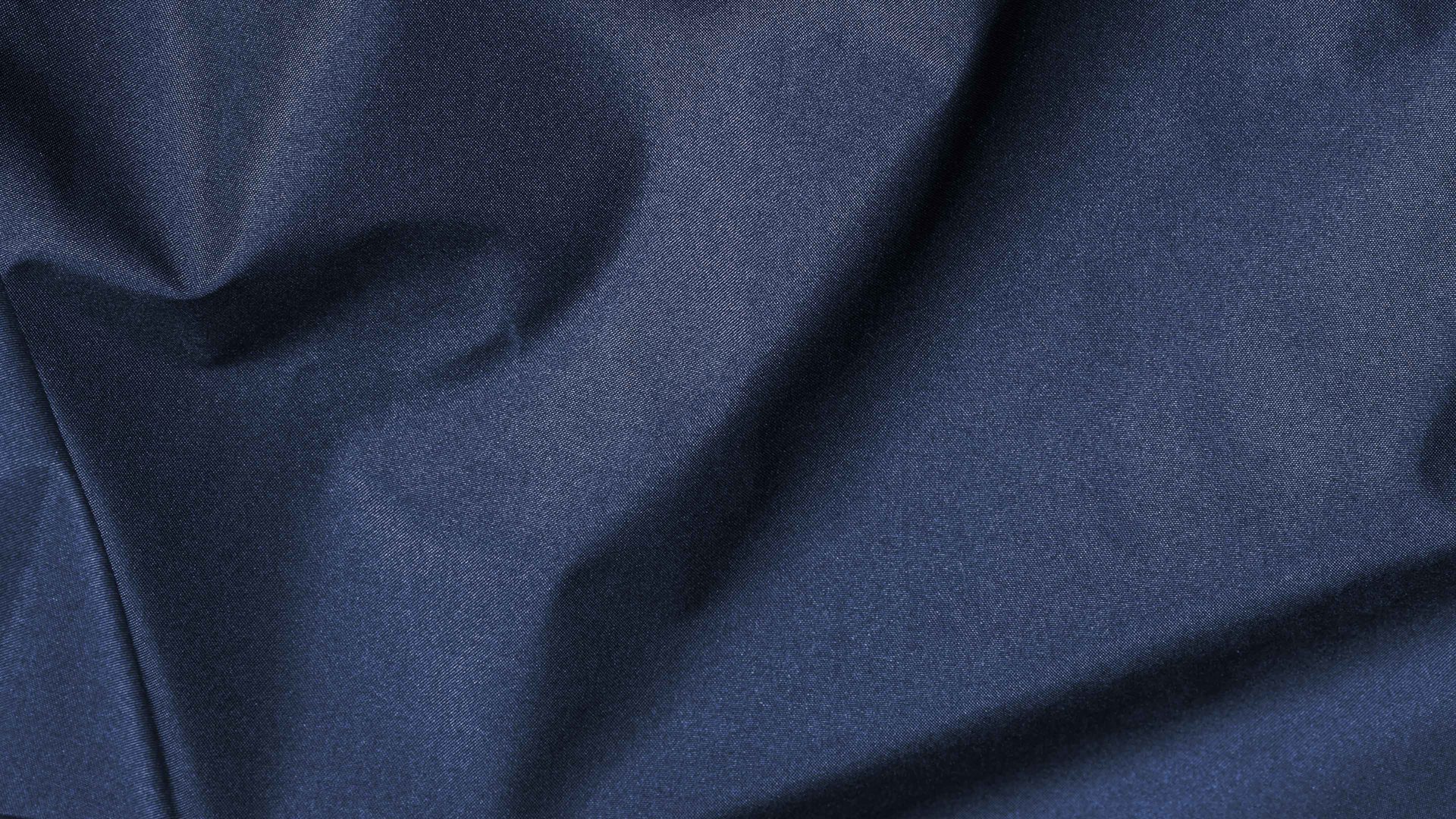 Sitzsack-Hocker Magma sitting point aus Kunstfaser in Jeansblau SITTING POINT Sitzsack-Hocker dotcom scuba® als Kleinmöbel jeansblaue Kunstfaser – Durchmesser ca. 50 cm