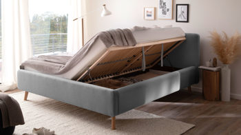 Bettgestell Meise.möbel aus Stoff in Hellgrau Polsterbettgestell Mattis mit Bettkasten hellgraues Flachgewebe Aspen 92 & Holzfüße - Liegefläche ca. 180 x 200 cm