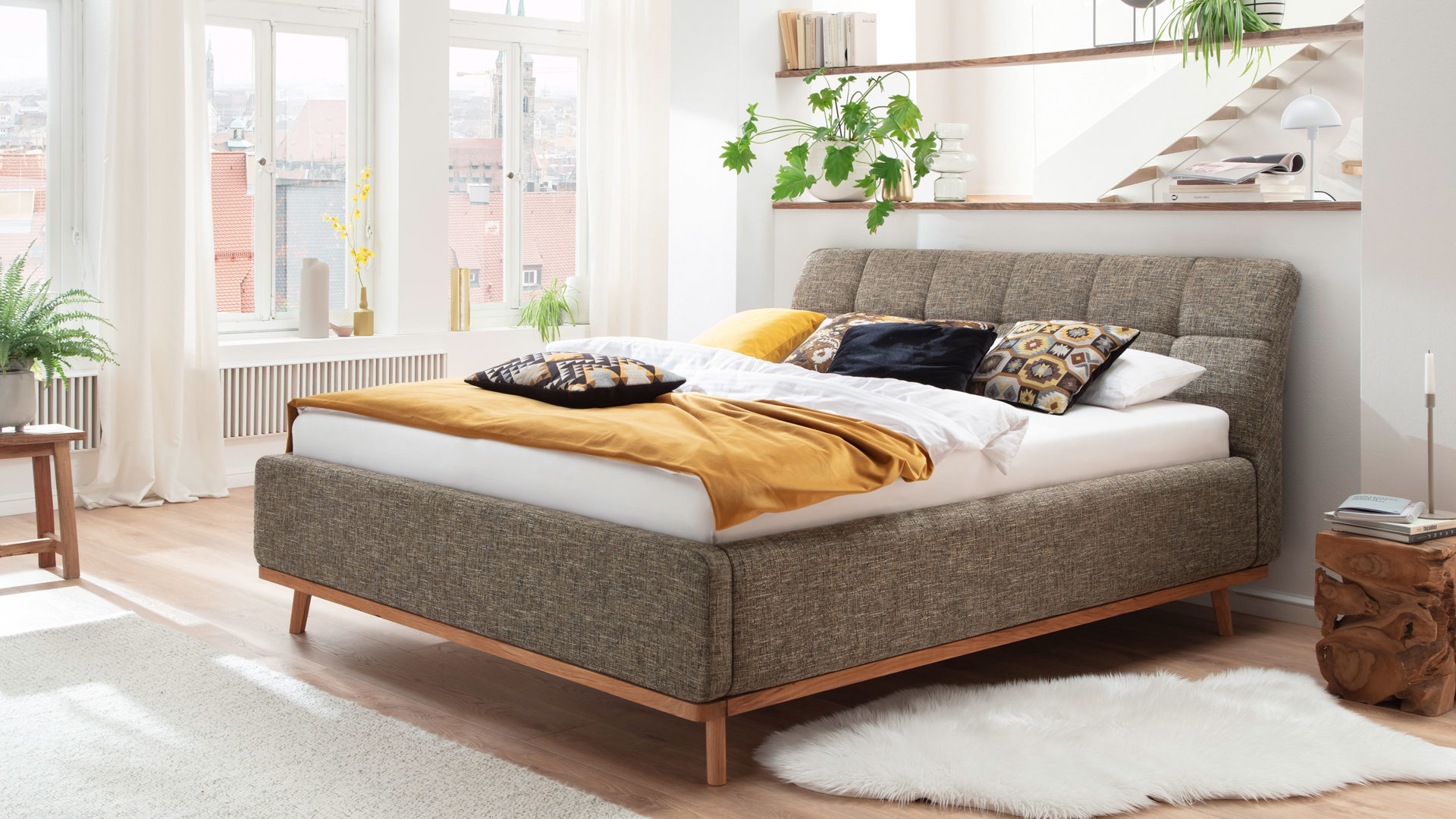 Polsterbett Meise.möbel aus Stoff in Braun Polsterbettgestell Mila mit Bettkasten und Holzrahmen, gestepptes Kopfteil brauner Struktur Bezug Building 801 - Liegefläche ca. 180 x 200 cm