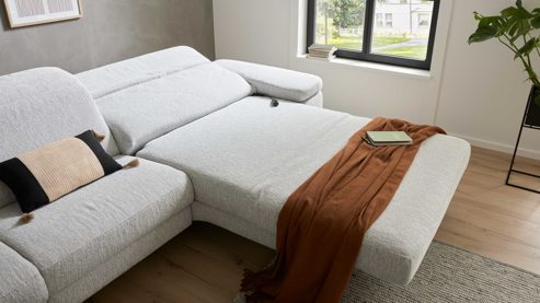 Funktion Interliving aus Metall in Transparent Interliving Sofa Serie 4065 – Relaxfunktion motorisch