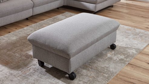 Polsterhocker comfortmaster besser sitzen, liegen, leben aus Stoff in Hellgrau Comfortmaster Spektra 1488 - Polsterhocker mit Rollen und Stauraum hellgraues Flachgewebe Loop 02 jet – ca. 113 x 70 cm