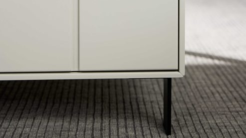 Couchtisch Interliving aus Holz in Weiß Interliving Wohnzimmer Serie 2030 PLUS - Couchtisch Sahara Creme & Granitfurnier - zwei Türen, eine Schublade, ca. 110 x 60 cm